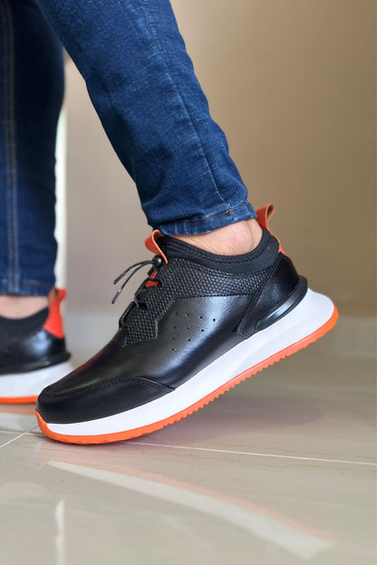 TENIS PARA HOMBRE EN CUERO NEGRO X SUELA BLANCA NARANJA / REF: VIGO D 19